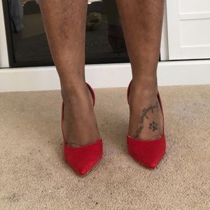 Red embroidered pumps. Never worn